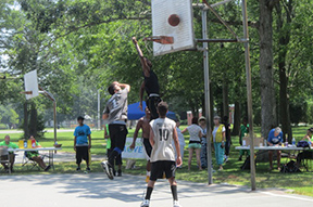 members of 3rd EyE playing basketball at Buttonwood Park